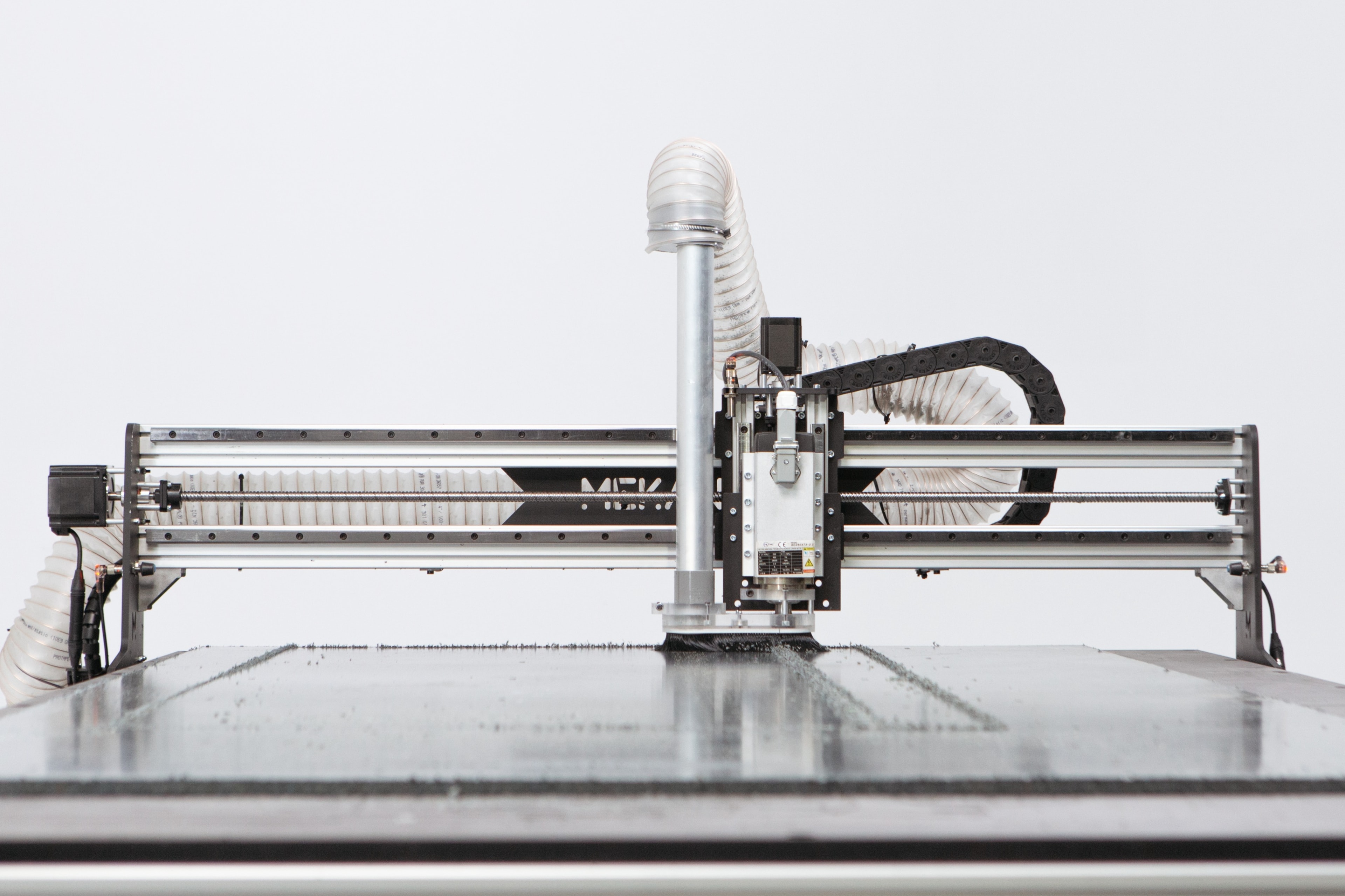 Front view of the  Fab milling a large plastic sheet
