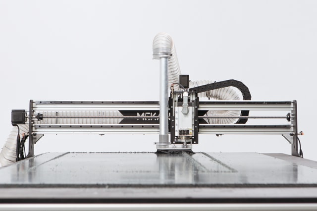 Front view of the  Fab milling a large plastic sheet