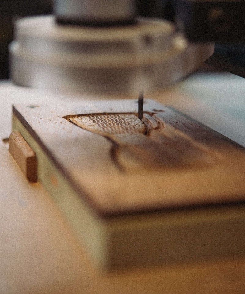 close-up on a CNC milling in wood a bowtie