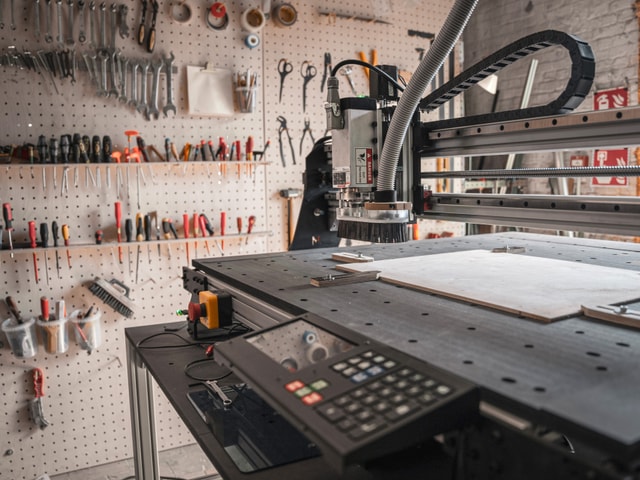 Mekanika Pro CNC milling machine 3/4 angle close up picture with hand tools in the background