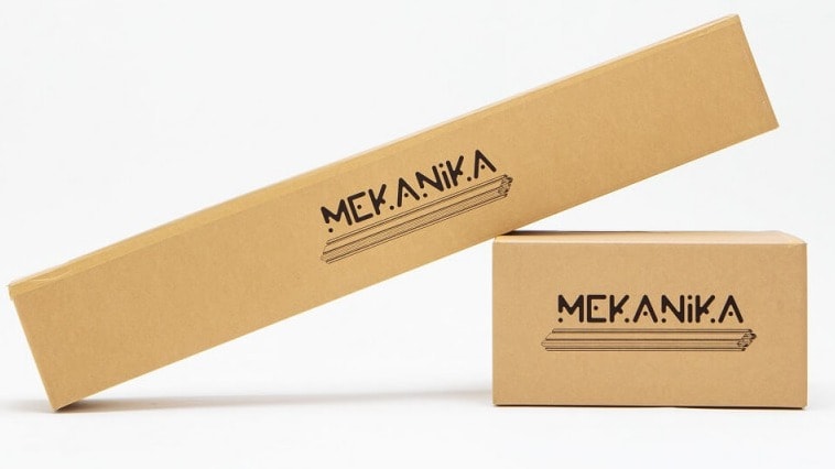 Two cardobard boxes branded with the Mekanika logo