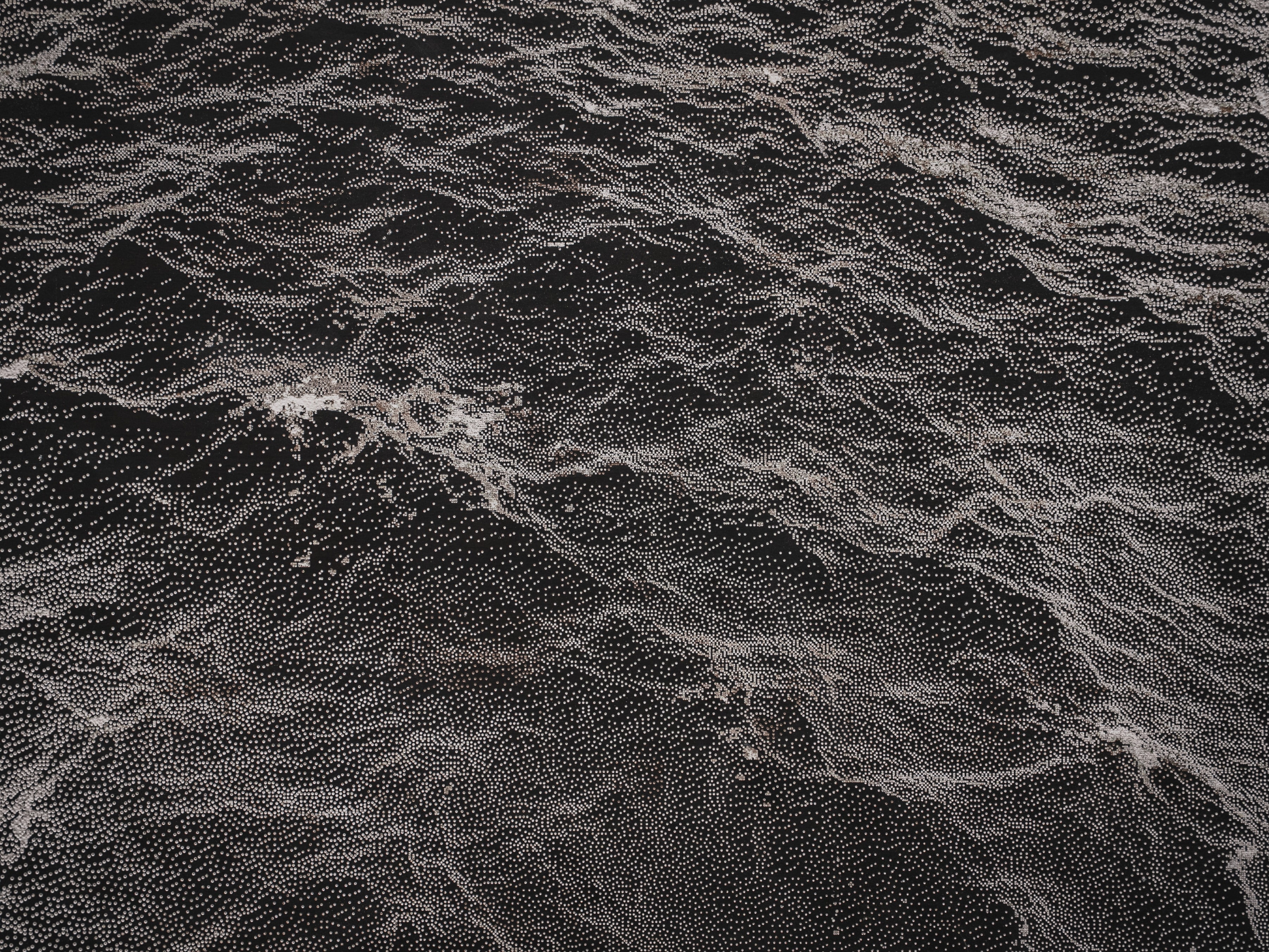 dark panel with engraved wave motive - final art piece by Studio Lemercier