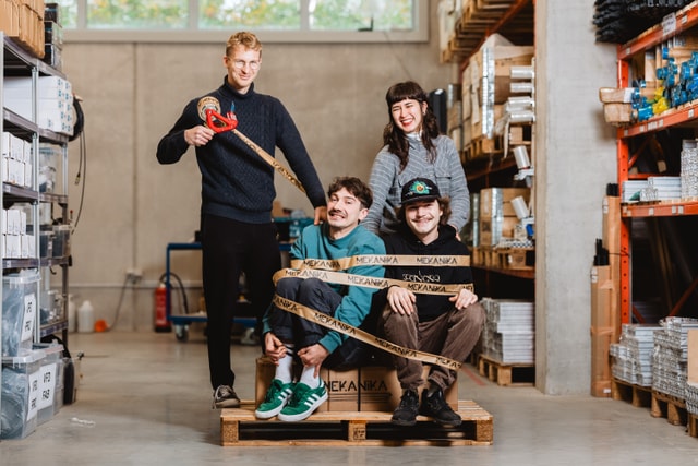 The Mekanika production team funny photo on a pallet
