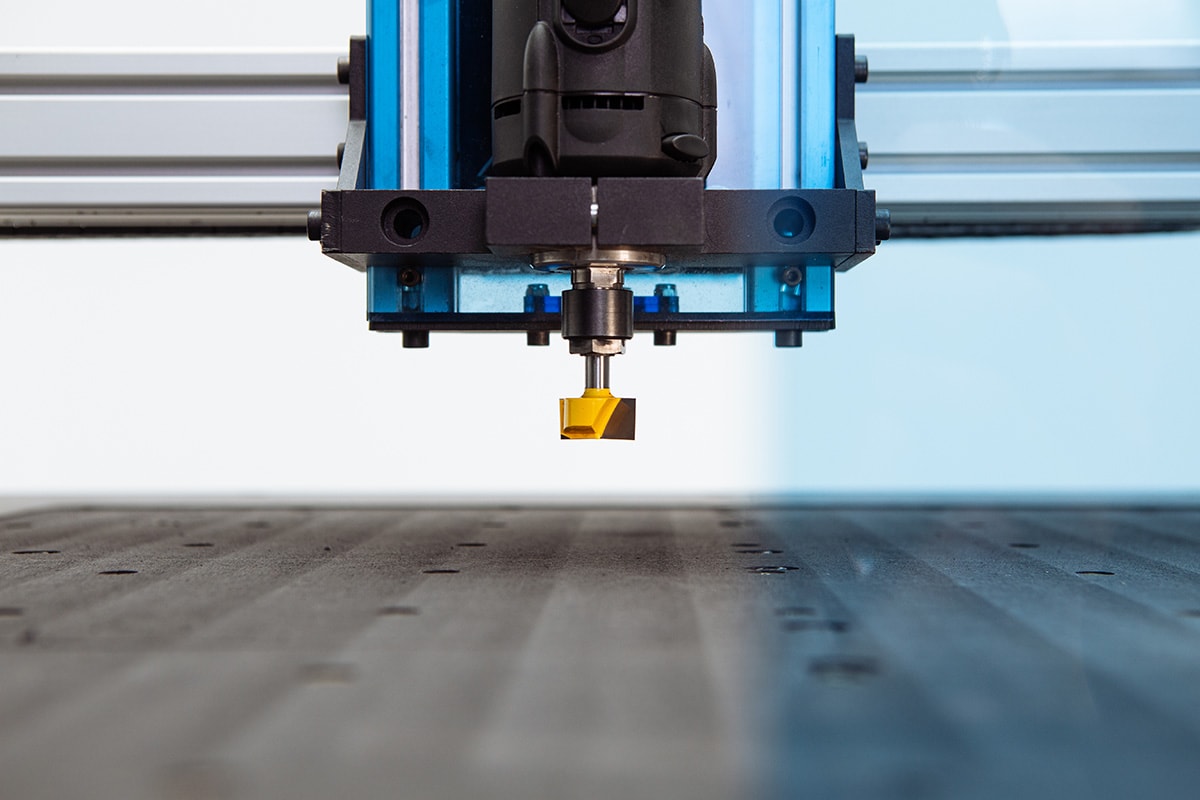 Mekanika Evo CNC milling machine close up frontview with a face endmill of 25mm