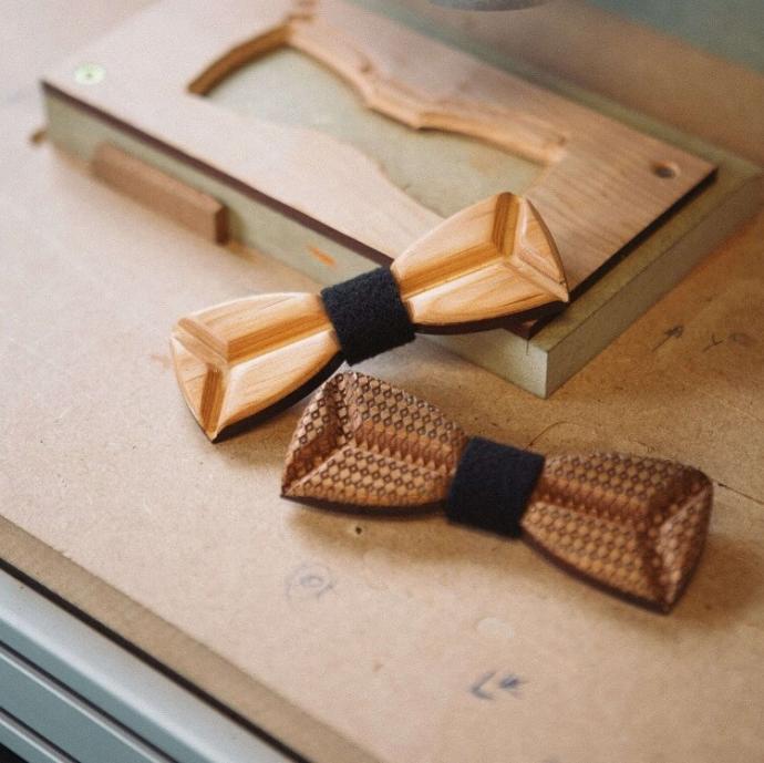 Bowties milled in wood by a CNC milling machine