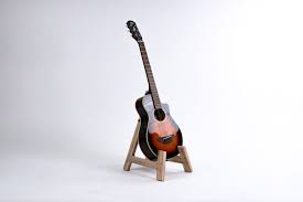 Guitar on a guitar stand made with a CNC router