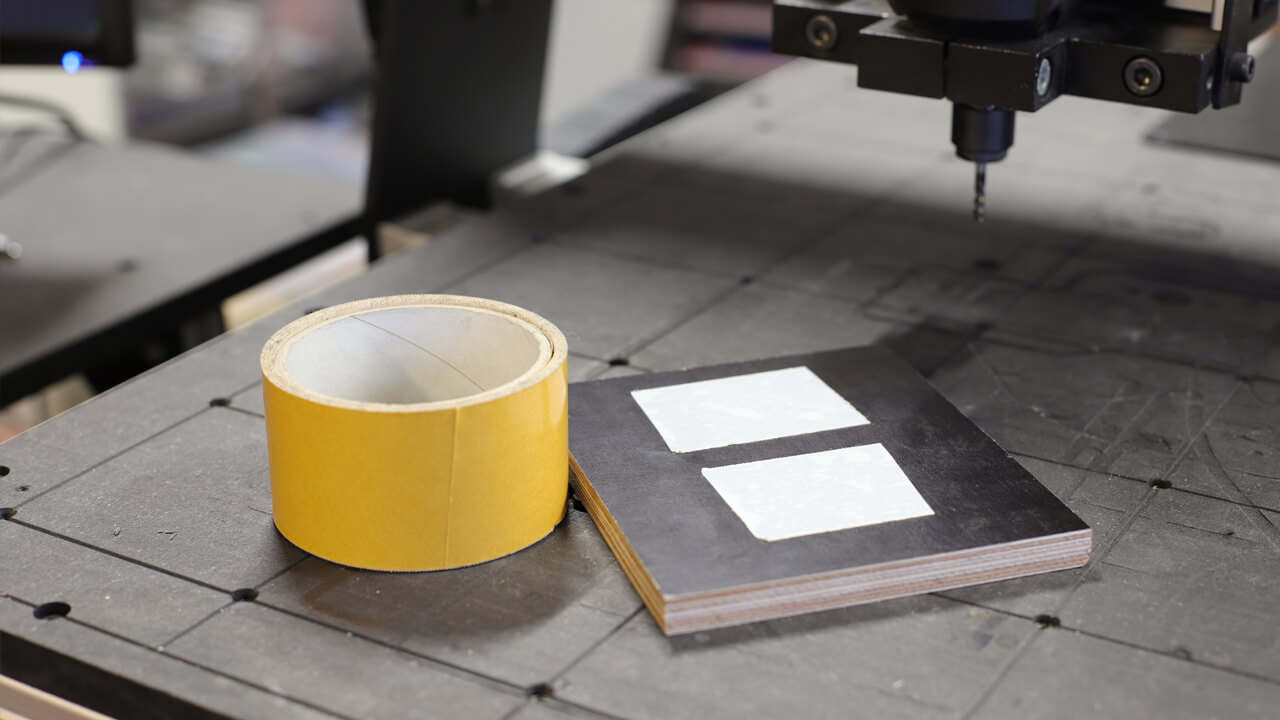CNC clamping - double-sided tape Using double-sided tape to clamp small parts